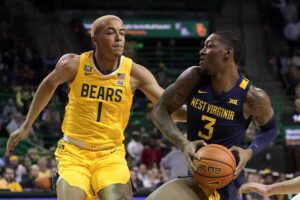 James Akinjo scores 25 points as Baylor overcomes WVU 81-77